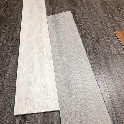 Σύγχρονο σχεδιασμό SPC δαπέδα 1,8m 6,5mm πυρόστακτο βινυλικό μαρμάρινο γυαλιστερό φινίρισμα πέτρα βλέμμα πτώση και κλειδαριά ξύλο Shandong Uk αποθήκη